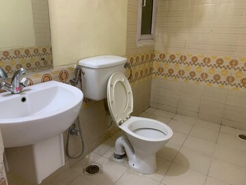 Bathroom in 2 BHK Apartment at Ansal API Celebrity Gardens, Sushant Golf City – for Rent