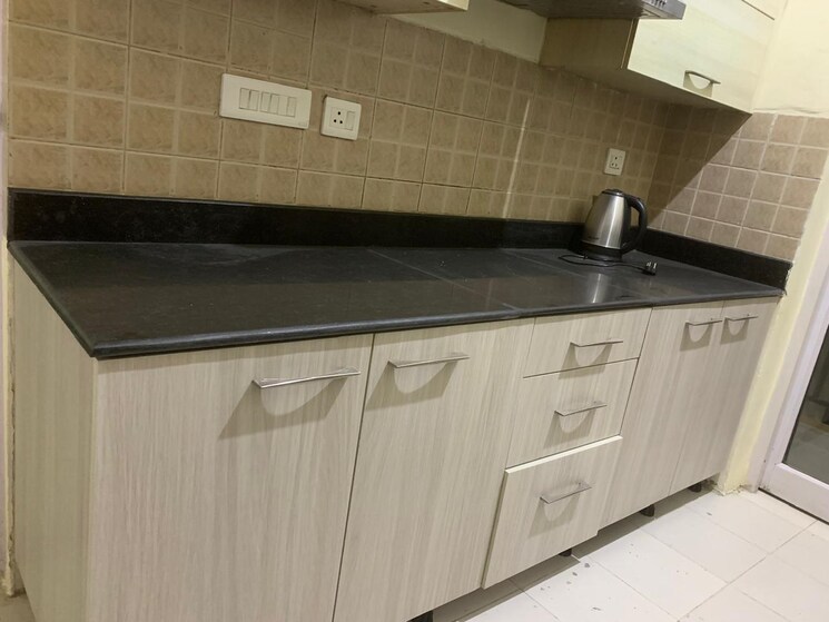 Kitchen, ansal-api-celebrity-gardens 2 Bedroom 1483 Sq.Ft. Apartment In Sushant Golf City Lucknow 8675506