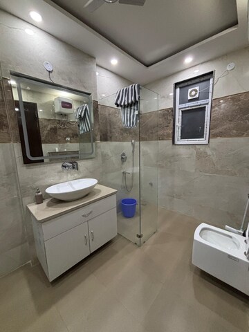 Bathroom in 3 BHK Builder Floor at Ansal Sushant Lok I, Sector 43 – for Rent