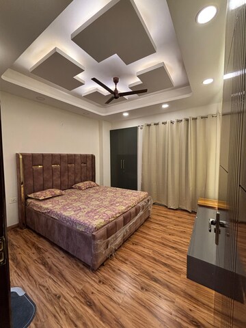 Bedroom in 3 BHK Builder Floor at Ansal Sushant Lok I, Sector 43 – for Rent