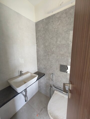 Bathroom in 1 BHK Apartment at Omkar Signet, Malad East – for Rent