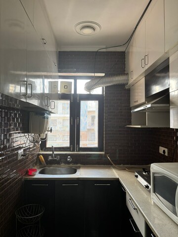 Kitchen in 3 BHK Builder Floor at Ansal Sushant Lok I, Sector 43 – for Rent