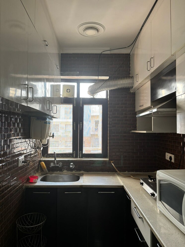 Kitchen, ansal-sushant-lok-i 3 Bedroom 270 Sq.Yd. Builder Floor In Sector 43 Gurgaon 8675529