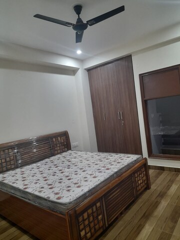 Bedroom in 3 BHK Builder Floor at Ansal Sushant Lok I, Sector 43 – for Rent