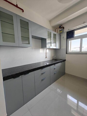 Kitchen in 2 BHK Apartment at Ashar Axis, Majiwada – for Rent