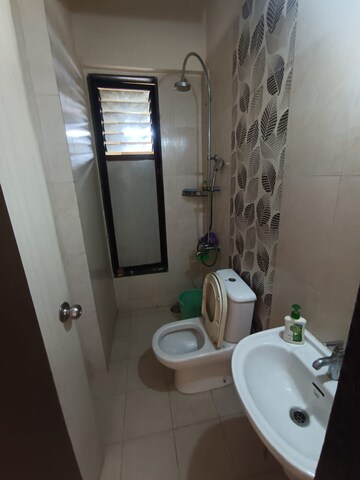 Bathroom in 1 BHK Apartment at Ajmera Yogidham Ruby, Kalyan West – for Rent