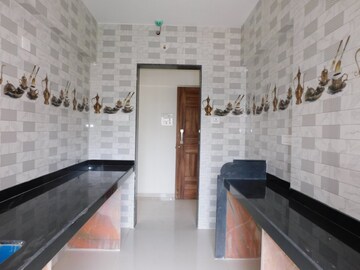 Kitchen in 2 BHK Apartment at National Trinity Paradise, Shilphata – for Sale