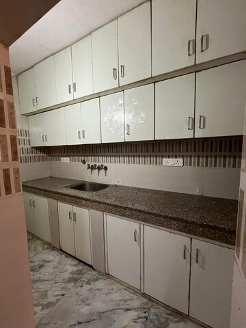 Kitchen in 1.5 BHK Apartment at Paschim Vihar – for Rent