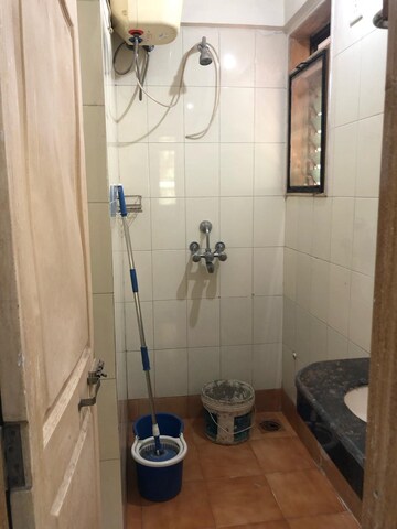 Bathroom in 1 BHK Apartment at Dindoshi Onkar CHS, Malad East – for Rent