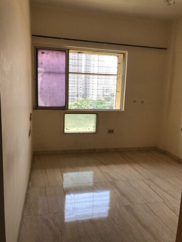 Room in 1 BHK Apartment at Riddhi Garden, Malad East – for Rent