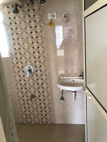 Bathroom in 1 BHK Apartment at Riddhi Garden, Malad East – for Rent