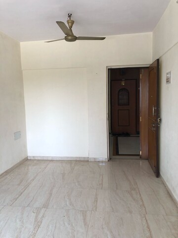 Room in 1 BHK Apartment at Riddhi Garden, Malad East – for Rent