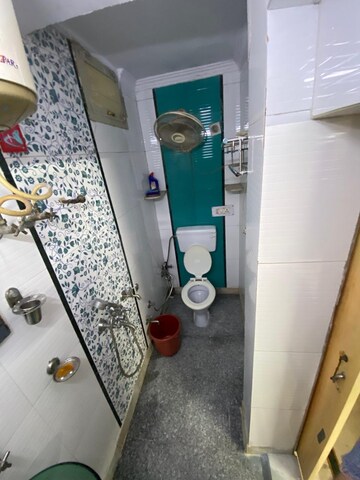 Bathroom in 1.5 BHK Apartment at Paschim Vihar – for Rent