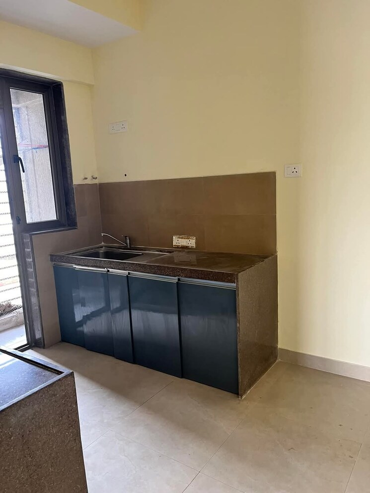 Kitchen, bhimjyani-verraton 2.5 Bedroom 980 Sq.Ft. Apartment In Manpada Thane 8675658
