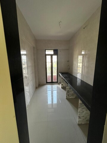 Building Lobby in 1.5 BHK Apartment at Mandar Glenmark, Kharigaon – for Rent