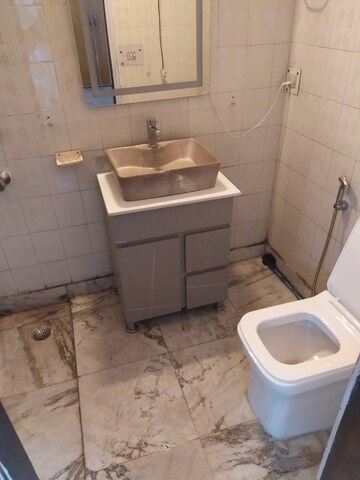 Bathroom in 3 BHK Builder Floor at Kalkaji – for Rent