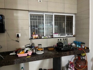 Kitchen in 1 RK Apartment at Gera Shrishti, Wagholi – for Rent