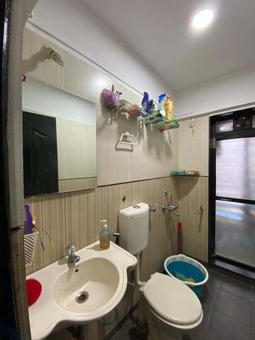 Bathroom in 2 BHK Apartment at Lalani Residency, Kavesar – for Rent