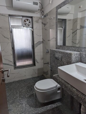 Bathroom in 3 BHK Apartment at Kalpataru Hills Phase II, Manpada – for Rent