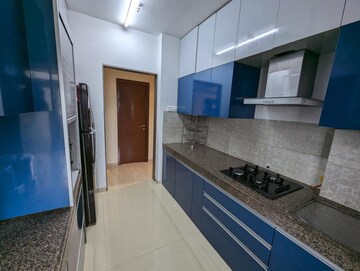Kitchen in 3 BHK Apartment at Kalpataru Hills Phase II, Manpada – for Rent