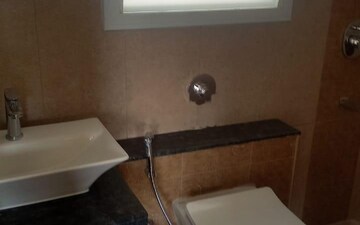 Bathroom in 2 BHK Apartment at Puravankara Silversands, Mundhwa – for Rent