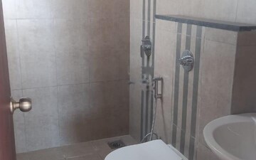 Bathroom in 2 BHK Apartment at Puravankara Silversands, Mundhwa – for Rent