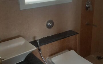 Bathroom in 2 BHK Apartment at Puravankara Silversands, Mundhwa – for Rent