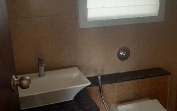 Bathroom in 2 BHK Apartment at Puravankara Silversands, Mundhwa – for Rent