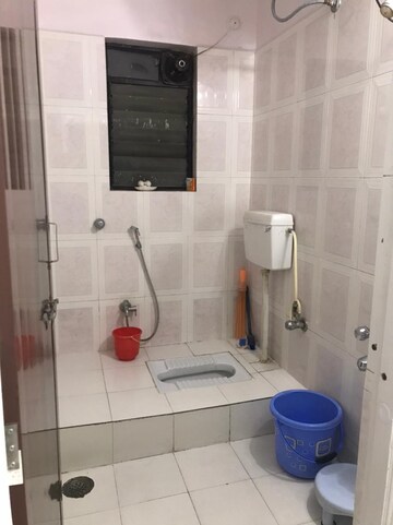 Bathroom in 3 BHK Apartment at Dahanukar Colony – for Sale