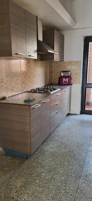 Kitchen in 3.5 BHK Villa at Raheja Vedaanta, Sector 108 – for Rent