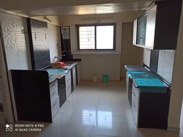 Kitchen in 2 BHK Apartment at Woodland Avenue, Kothrud – for Sale
