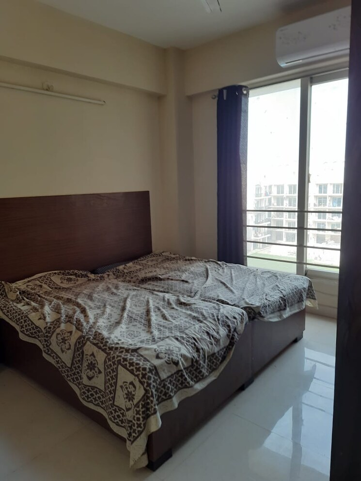 Bedroom, signature-the-serenas 2 Bedroom 724 Sq.Ft. Apartment In Sohna Sector 36 Gurgaon 8676405