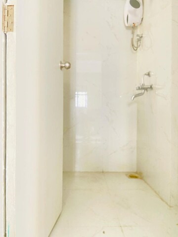 Bathroom in 1 BHK Apartment at Runwal Gardens Phase I, Dombivli East – for Rent