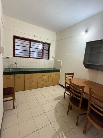 Kitchen in 2 BHK Apartment at Ravetkar Arihant Shree, Dahanukar Colony – for Rent