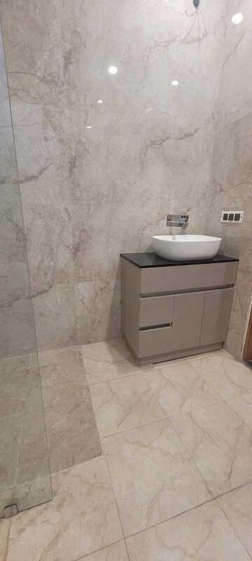 Bathroom in 4 BHK Builder Floor at Sushant Lok I – for Rent