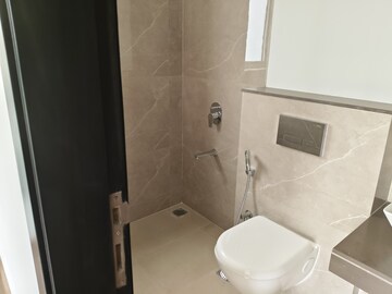Bathroom in 1 BHK Apartment at Piramal Revanta Ravin, Mulund West – for Sale