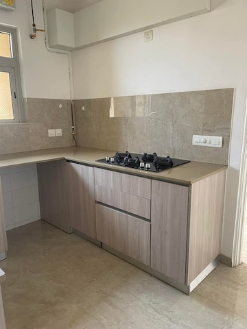 Kitchen in 2 BHK Apartment at Hiranandani Cardinal, Ghodbunder Road – for Rent