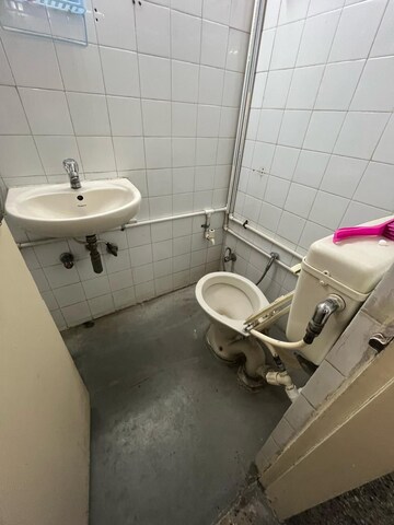 Bathroom in 2 BHK Apartment at Woodland Avenue, Kothrud – for Rent