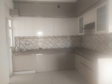Kitchen in 3 BHK Apartment at Ajnara Le Garden, Sector 16b Greater Noida – for Rent