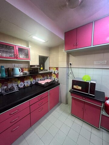 Kitchen in 2 BHK Apartment at Aakash Gagan Dream, Vasai East – for Sale