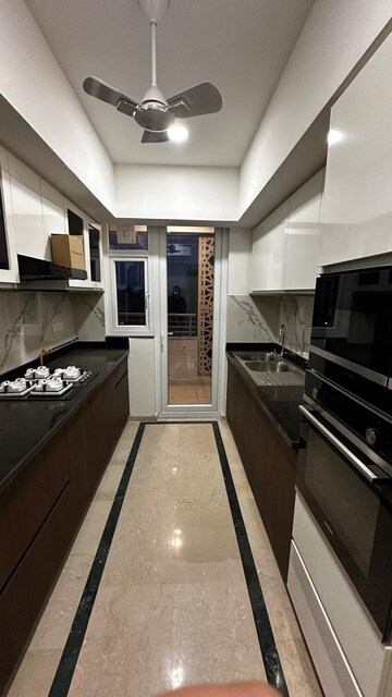 Kitchen in 4 BHK Builder Floor at DLF Alameda, Sector 73 – for Sale