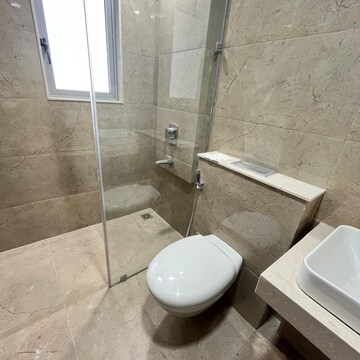 Bathroom in 3 BHK Apartment at Oberoi Sky City, Khande Rao Dongari – for Rent