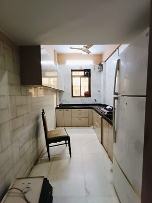 Kitchen in 2 BHK Apartment at Marine Drive – for Sale