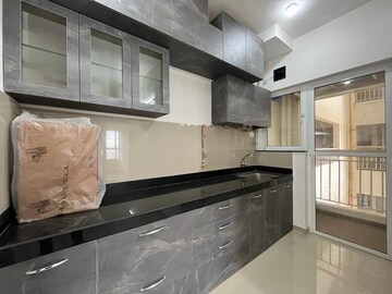 Kitchen in 2 BHK Apartment at Godrej Greens, Undri – for Rent