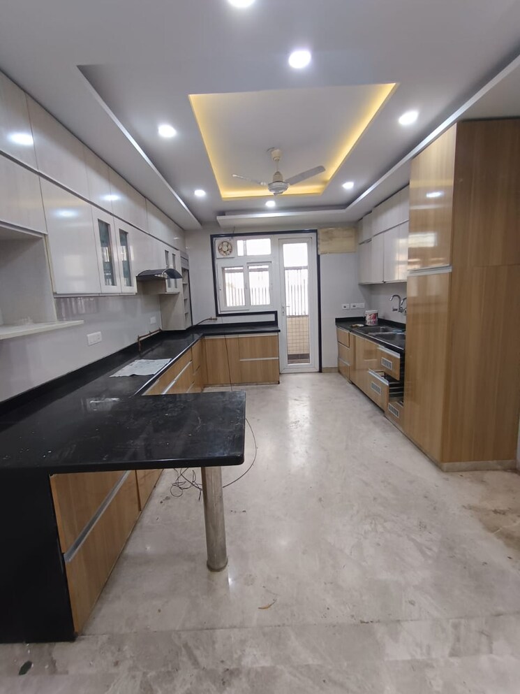 Kitchen, triveni-apartments-cghs 3.5 Bedroom 1350 Sq.Ft. Apartment In Paschim Vihar Delhi 8677956