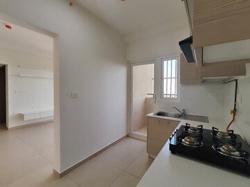 Kitchen in 2 BHK Apartment at Bhartiya Nikoo Homes Phase 2, Thanisandra Main Road – for Sale