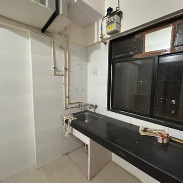 Kitchen in 1 BHK Apartment at JVM Aroma, Kasarvadavali – for Rent