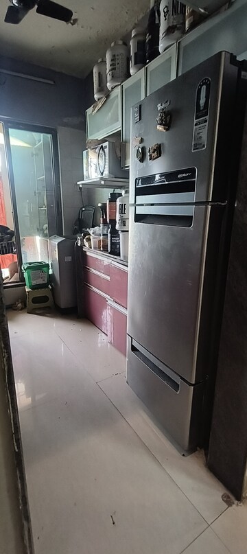 Kitchen in 2 BHK Apartment at Tharwani Rosewood Heights, Kharghar Sector 10 – for Rent