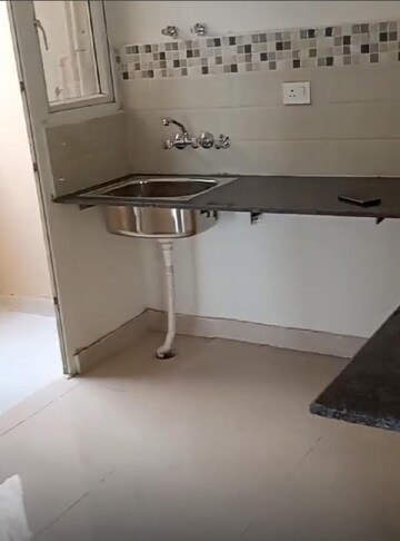 Kitchen in 2.5 BHK Apartment at Signature Global Golf Greens, Sector 79 – for Sale