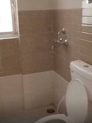 Bathroom in 2.5 BHK Apartment at Signature Global Golf Greens, Sector 79 – for Sale